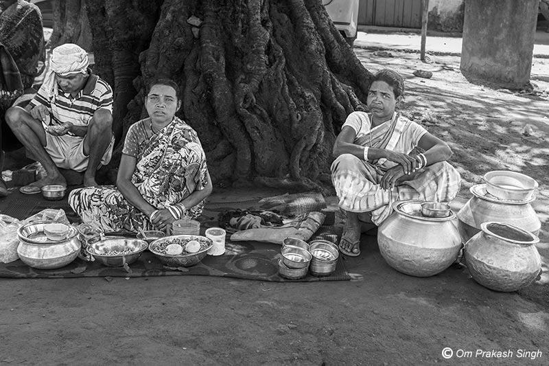 Women vendors from a Jal Jeevan Mission (JJM) beneficiary village selling locally prepared food items in the market in Khunti district, Jharkhand, India